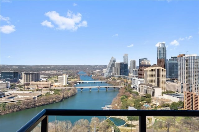 property's view of city featuring a water view