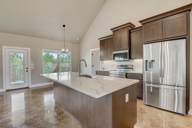 kitchen with tasteful backsplash, stainless steel appliances, sink, a chandelier, and light stone countertops