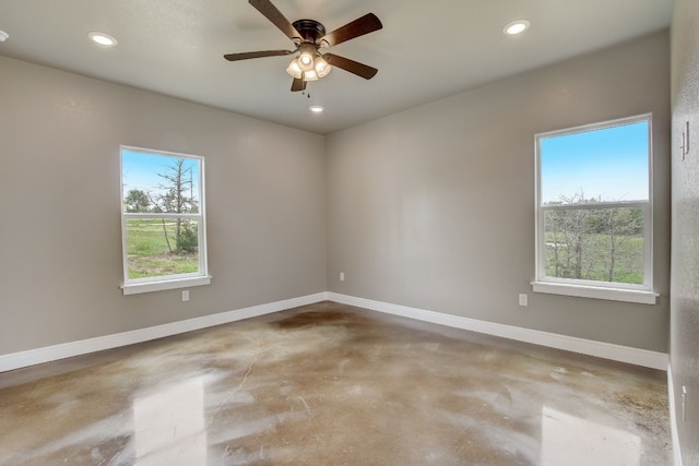 unfurnished room with ceiling fan