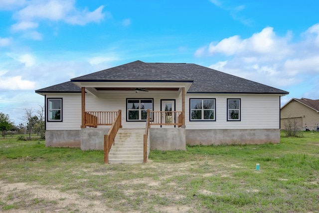 back of house with ceiling fan