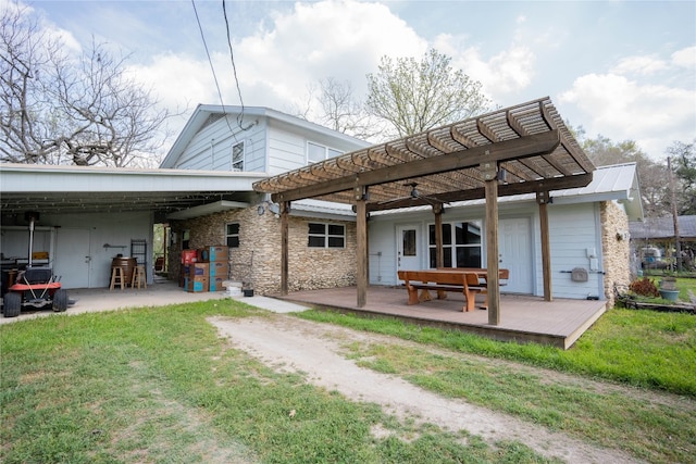 rear view of house featuring a pergola, a yard, and a patio