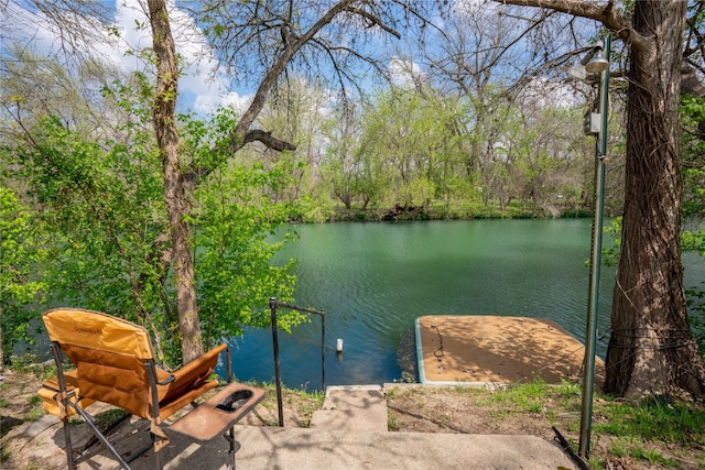 property view of water featuring a dock