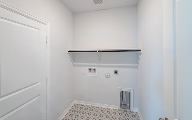 laundry area featuring electric dryer hookup, tile flooring, hookup for a gas dryer, and hookup for a washing machine