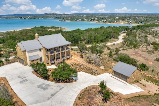 drone / aerial view featuring a water view