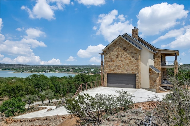 exterior space with a water view