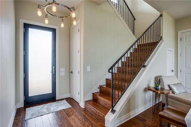 entrance foyer with dark hardwood / wood-style flooring