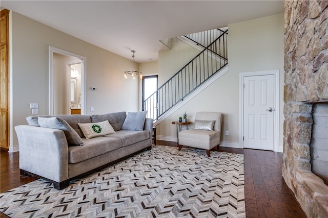 living room with light hardwood / wood-style flooring and a fireplace