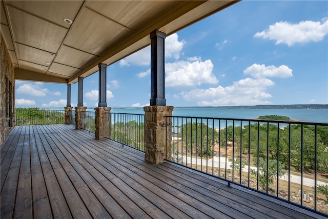 wooden terrace with a water view