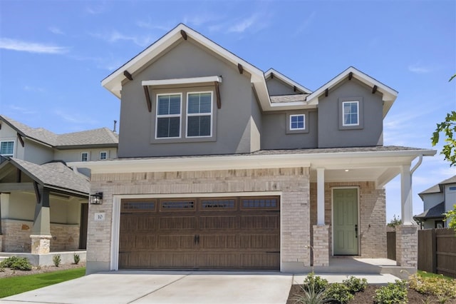 view of front of property with a garage