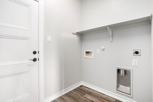 clothes washing area featuring hookup for an electric dryer, hookup for a gas dryer, dark wood-type flooring, and hookup for a washing machine