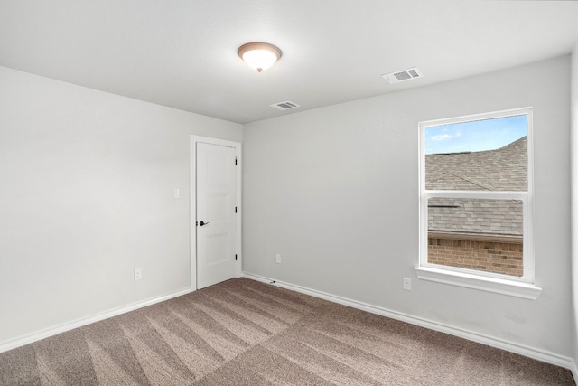 empty room with carpet floors