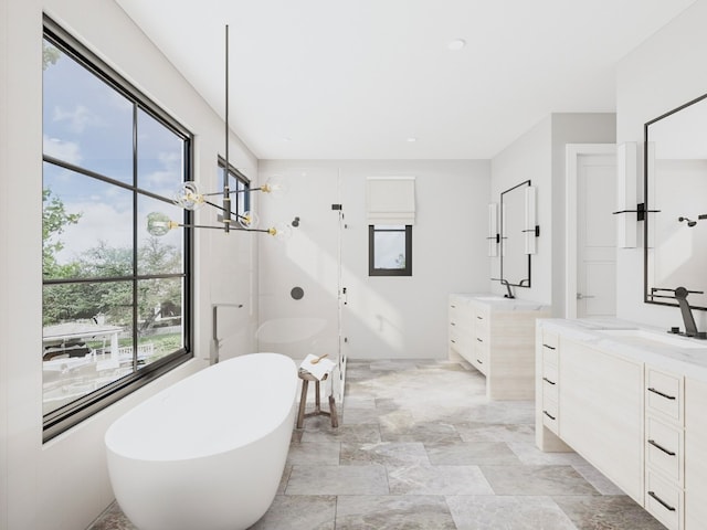 bathroom featuring plenty of natural light, plus walk in shower, and vanity