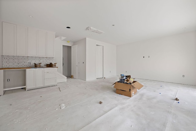 interior space with white cabinetry