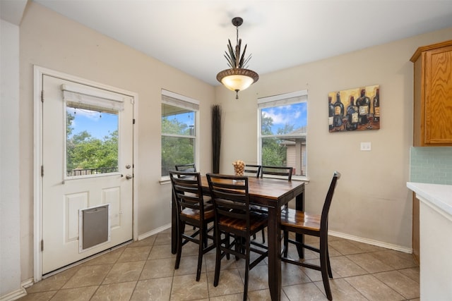 dining room with light tile floors