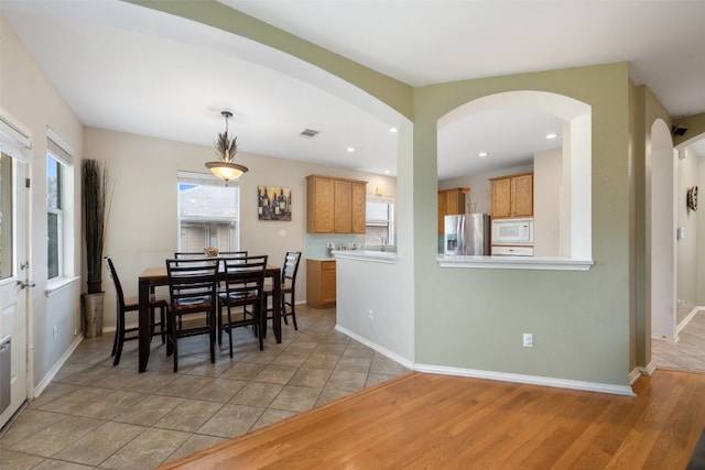 dining room featuring light hardwood / wood-style floors