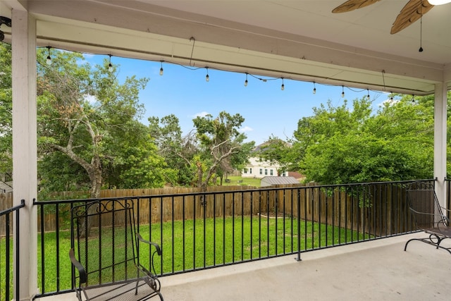 view of patio / terrace featuring ceiling fan