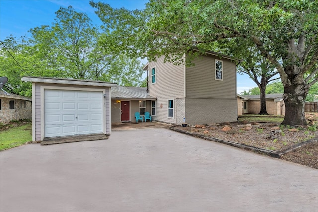 view of front of property featuring a garage