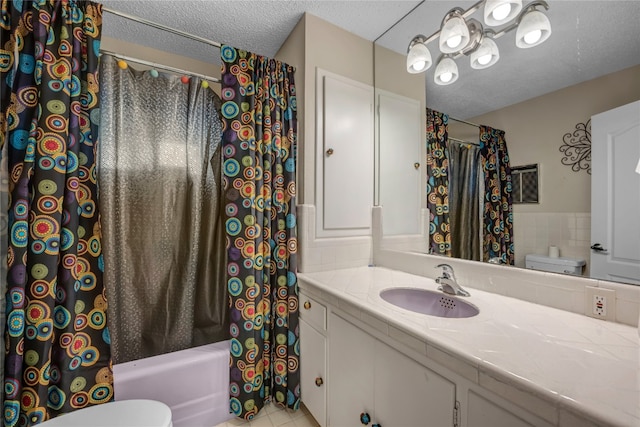 full bathroom featuring shower / bath combination with curtain, tile floors, toilet, and vanity