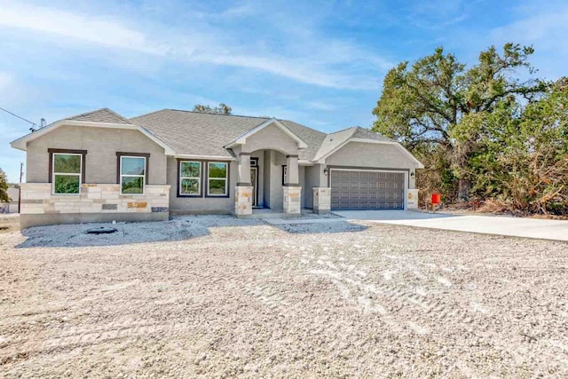 view of front of home with a garage