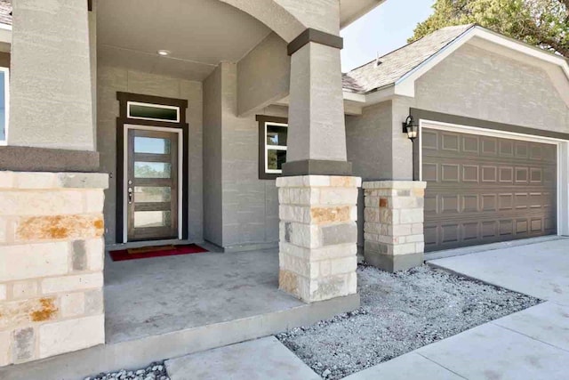 property entrance with a garage