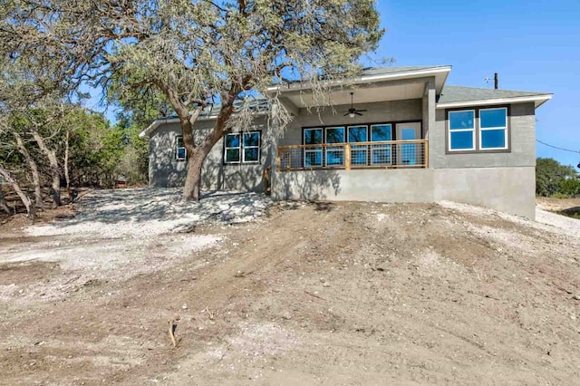 view of front of house with ceiling fan