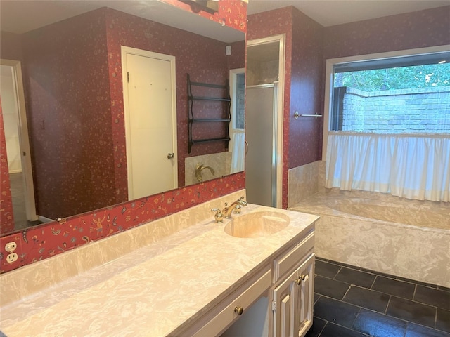 bathroom featuring vanity with extensive cabinet space and tile floors