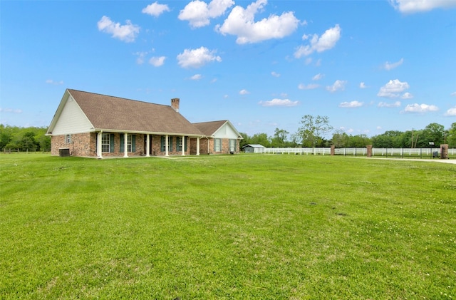 view of yard featuring central AC