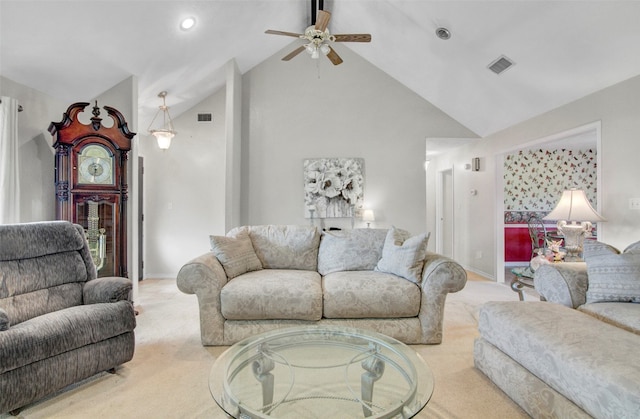 living room with light carpet, high vaulted ceiling, and ceiling fan