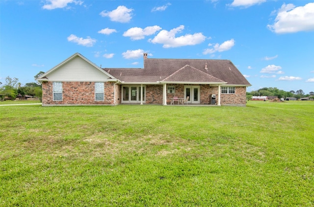 ranch-style home with a front yard