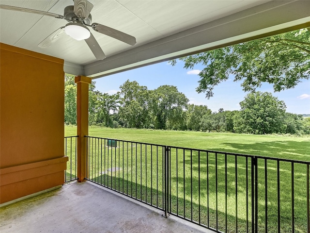 exterior space featuring ceiling fan