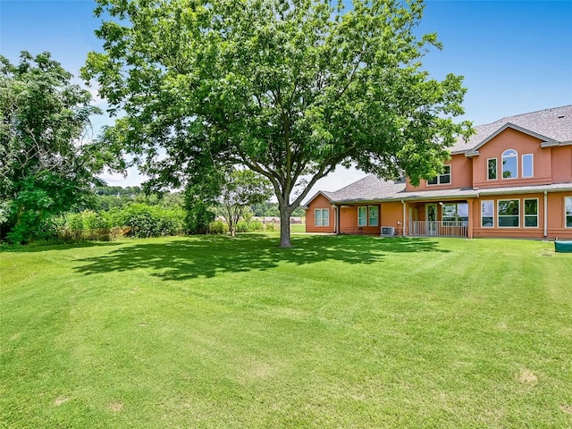 539 Colovista Pkwy Unit C101, Bastrop, TX 78602 - view of green lawn featuring covered porch and central air condition unit