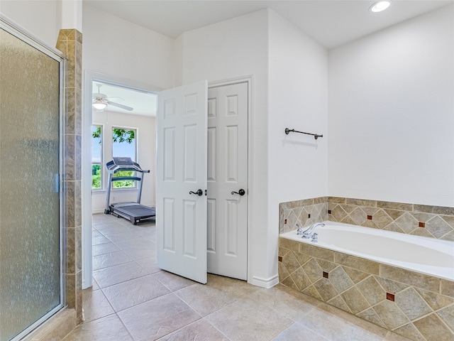539 Colovista Pkwy Unit C101, Bastrop, TX 78602 - full bathroom with a shower stall, a bath, a ceiling fan, tile patterned flooring, and recessed lighting