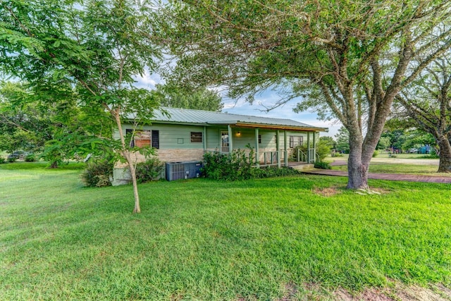 view of front of property with a porch and a front yard