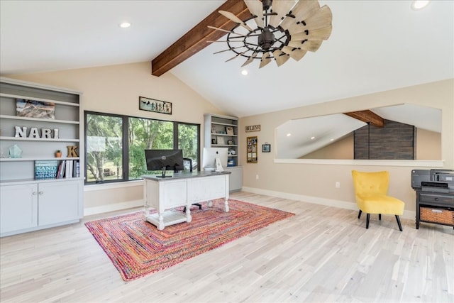 office space featuring ceiling fan, light hardwood / wood-style floors, and vaulted ceiling with beams