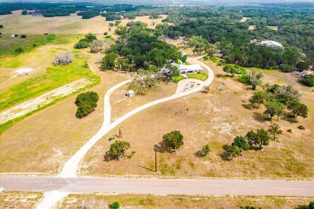 birds eye view of property featuring a rural view