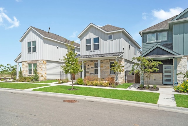 view of front of home featuring a front lawn