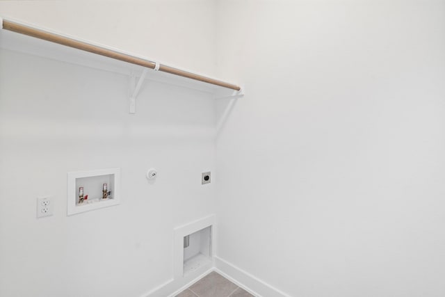 laundry area featuring washer hookup, tile patterned flooring, hookup for an electric dryer, and gas dryer hookup