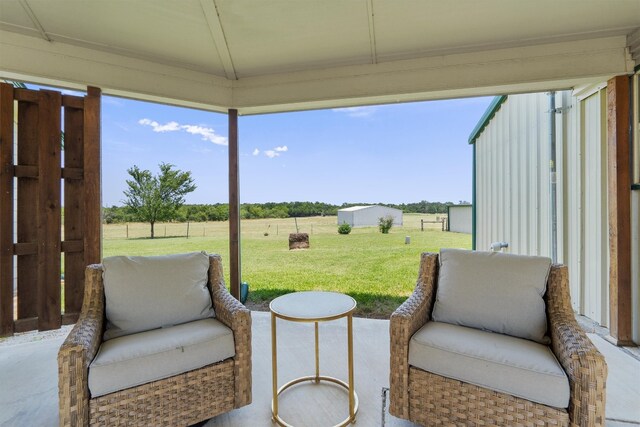 view of patio / terrace featuring a rural view and a gazebo