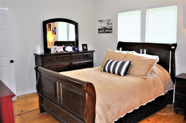 bedroom with light hardwood / wood-style flooring