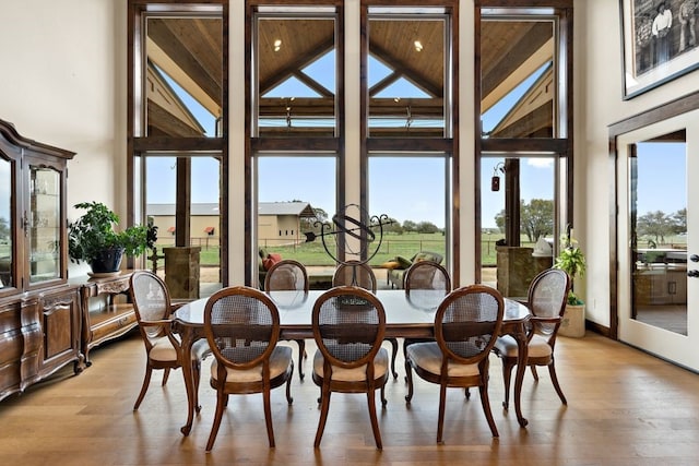 sunroom / solarium featuring french doors