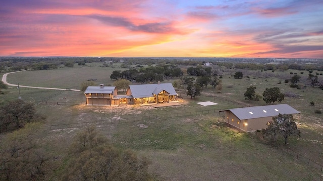 aerial view at dusk with a rural view