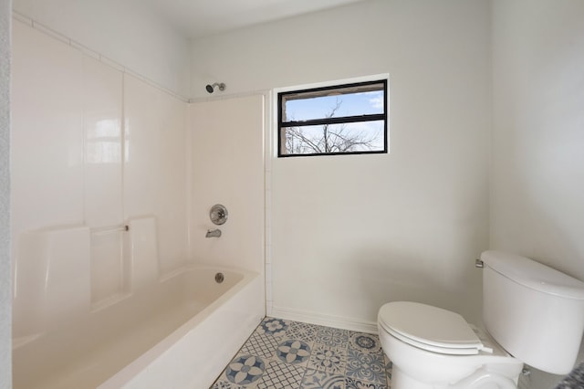 bathroom featuring  shower combination, toilet, and tile flooring