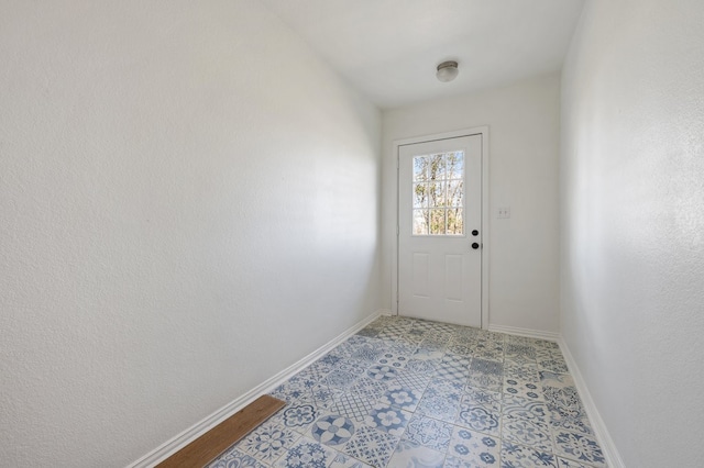 entryway with light tile floors