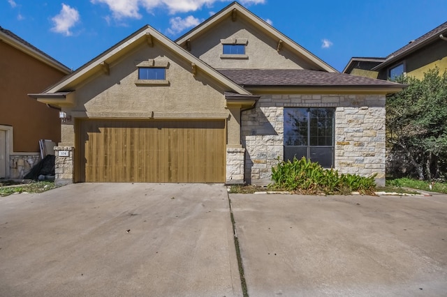 view of front of home with a garage