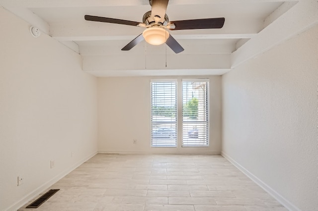 spare room with ceiling fan