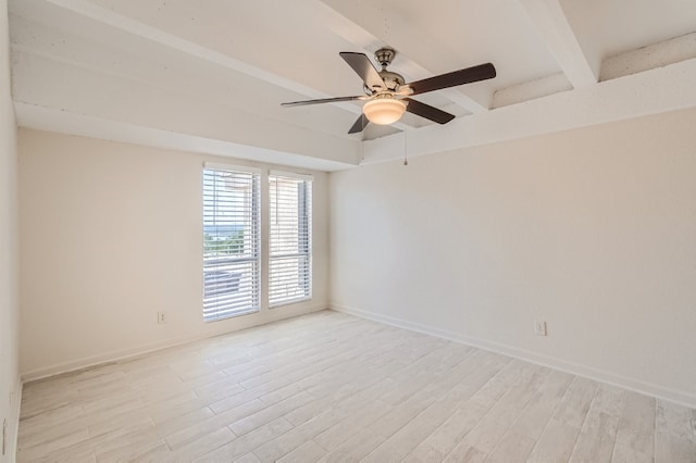 unfurnished room with ceiling fan, light hardwood / wood-style flooring, and beam ceiling