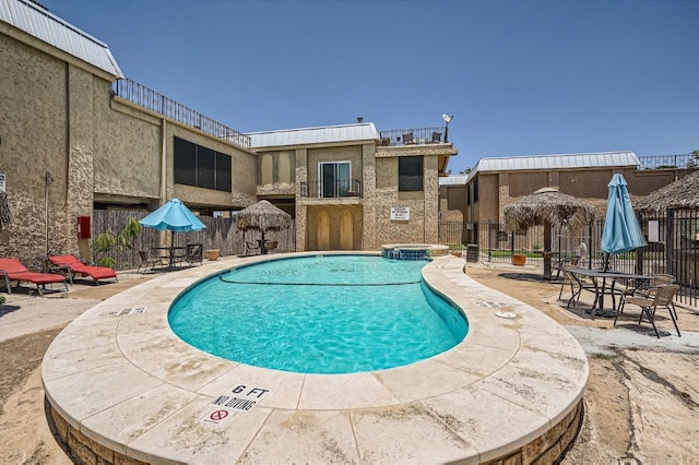 view of swimming pool featuring a patio area