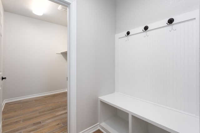 mudroom with wood-type flooring