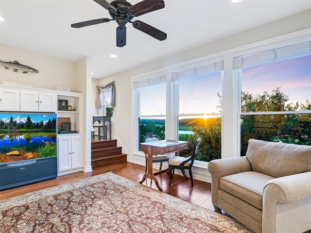 living room with ceiling fan, wood finished floors, and recessed lighting