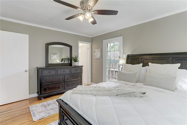 bedroom featuring crown molding, light wood-style flooring, baseboards, and ceiling fan